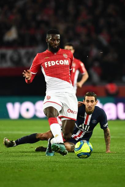 Monaco's French midfielder Tiemoue Bakayoko kicks the ball next to Paris SaintGermain's Argentine midfielder Angel Di Maria during the French L1...