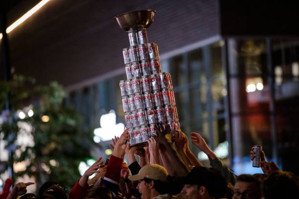 montreal-canadiens-fans-lift-a-stanley-cup-made-of-beer-cans-during-picture-id1233778565?k=20&m=1233778565&s=612x612&w=0&h=ach2B5bNaHy46w37YEb8ffYanZwRK0T1vP2jgMJ9sn4=