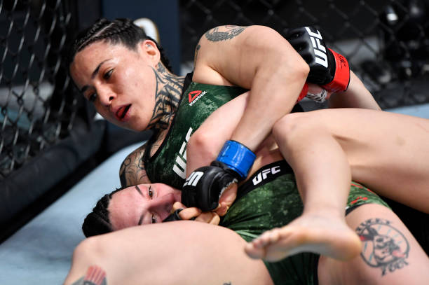Montserrat Conejo of Mexico grapples Cheyanne Buys in their strawweight fight during the UFC Fight Night event at UFC APEX on March 20, 2021 in Las...