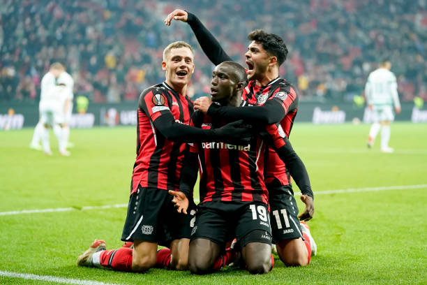 Moussa Diaby of Bayer 04 Leverkusen celebrates after scoring his team's third goal with teammates during the UEFA Europa League group G match between...