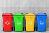 Multicoloured Garbage Trash Bins. 3d Rendering