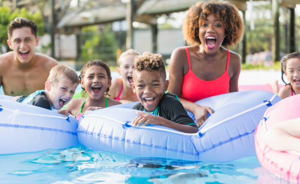 multiethnic children and young adults at water park picture