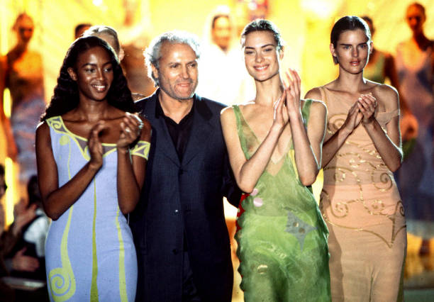 Naomi Campbell, Gianni Versace and Stella Tennant walks the runway at the Versace Haute Couture Spring/Summer 1996 fashion show during the Paris...