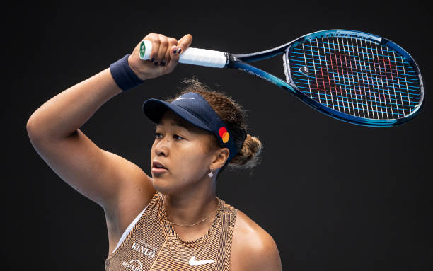Naomi Osaka of Japan hits a forehand against Alize Cornet of France during the Melbourne Summer Set at Melbourne Park on January 04, 2022 in...