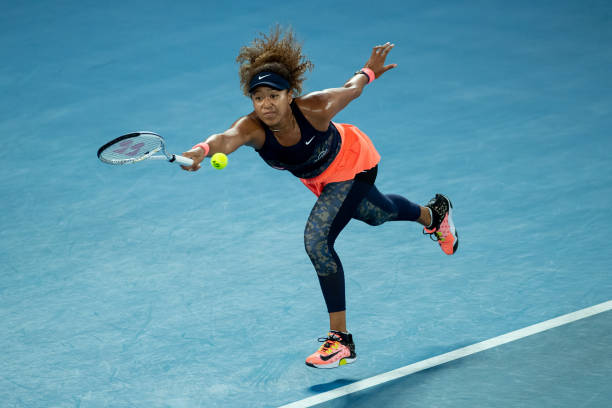 Naomi Osaka of Japan plays a forehand in her Women’s Singles Final match against Jennifer Brady of the United States during day 13 of the 2021...