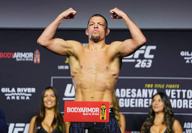 Nate Diaz poses on the scale during the UFC 263 ceremonial weigh-in at Gila River Arena on June 11, 2021 in Glendale, Arizona.