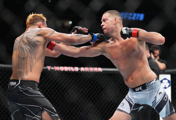 Nate Diaz punches Tony Ferguson in a welterweight fight during the UFC 279 event at T-Mobile Arena on September 10, 2022 in Las Vegas, Nevada.
