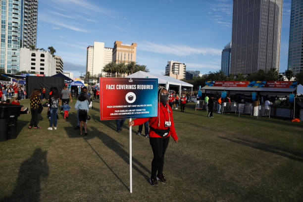 National Football League fans convene in downtown Tampa ahead of Super Bowl LV during the COVID-19 pandemic on January 30, 2021 in Tampa, Florida....