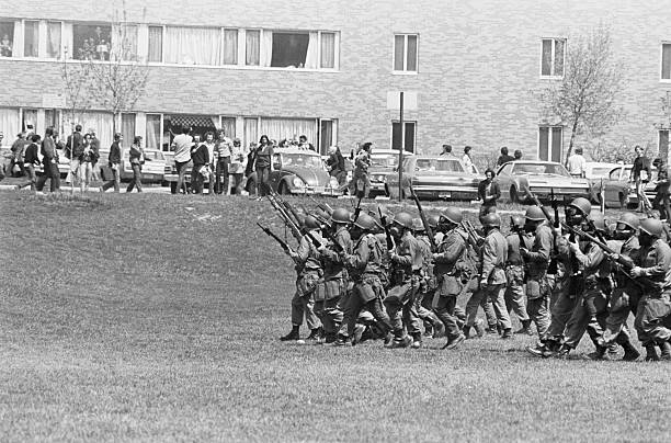 National Guardsmen are seen here on May 4th moving across the common on the Kent State campus where four antiwar protesters were shot and killed...