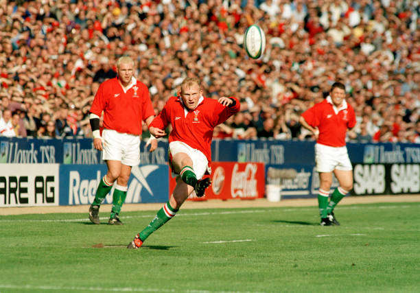 Neil Jenkins kicking for Wales during the Five Nations rugby union match between Wales and England at Wembley Stadium in London 11th April 1999. Wales won 32-31. All Wales home matches were played at Wembley due to the ongoing construction of the Millennium Stadium in Cardiff. (Photo by Mike Brett/Popperfoto via Getty Images/Getty Images)