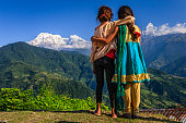 Nepali little girls looking at Annapurna South
