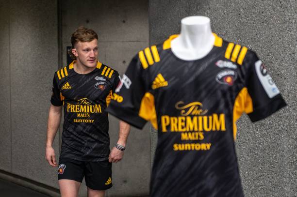 New Zealand rugby player Damian McKenzie attends a photocall after a press conference to mark joining Suntory Sungoliath at Ajinomoto Stadium in the Chofu area of Tokyo on December 21, 2021. (Photo by Philip FONG / AFP) (Photo by PHILIP FONG/AFP via Getty Images)