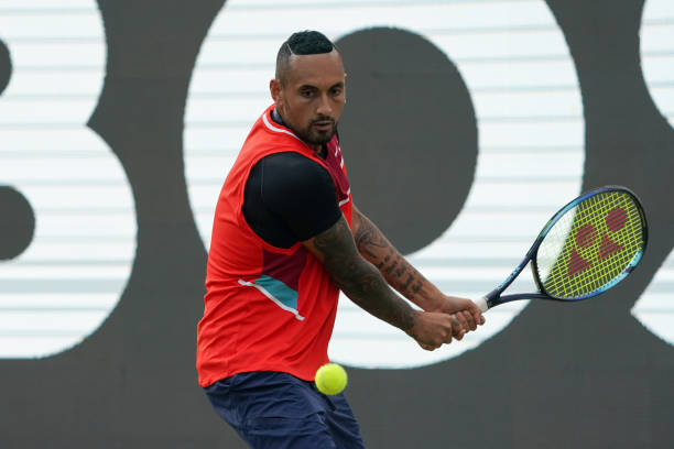 Nick Kyrgios of Australia plays a backhand during the quarterfinal match between Marton Fucsovics of Hungary and Nick Kyrgios of Australia during day...
