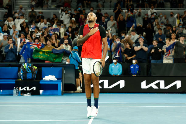 Nick Kyrgios of Australia reacts after winning his first round singles match against Liam Broady of Great Britain during day two of the 2022...