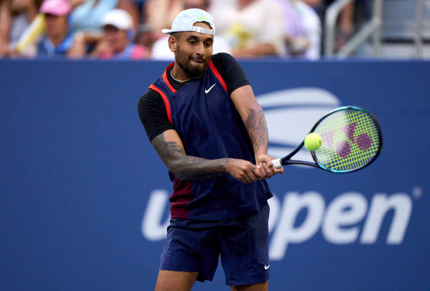 Nick Kyrgios of Australia returns a ball against Benjamin Bonzi of France in their Men's Singles Second Round match on Day Three of the 2022 US Open...