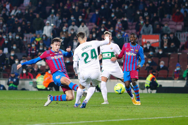 Nico Gonzalez of FC Barcelona scores his side's 3rd goal during the LaLiga Santander match between FC Barcelona and Elche CF at Camp Nou on December...