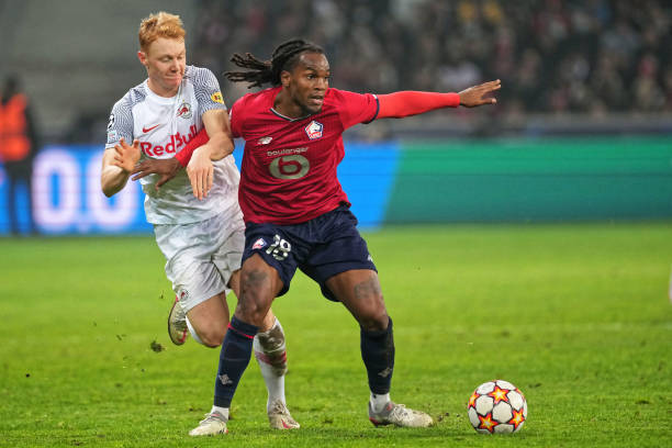 Nicolas Seiwald of FC Salzburg competes for the ball with Renato Sanches of Lille OSC during the UEFA Champions League group G match between Lille...