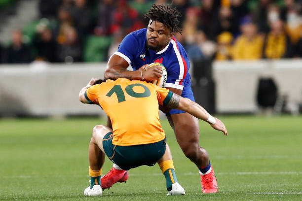 MELBOURNE, AUSTRALIA - JULY 13: Noah Lolesio of the Wallabies tackles Jonathan Danty of France during the International Test match between the Australian Wallabies and France at AAMI Park on July 13, 2021 in Melbourne, Australia. (Photo by Darrian Traynor/Getty Images)