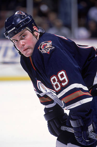nov-2001-mike-comrie-of-the-edmonton-oilers-looking-on-during-the-picture-id1486224