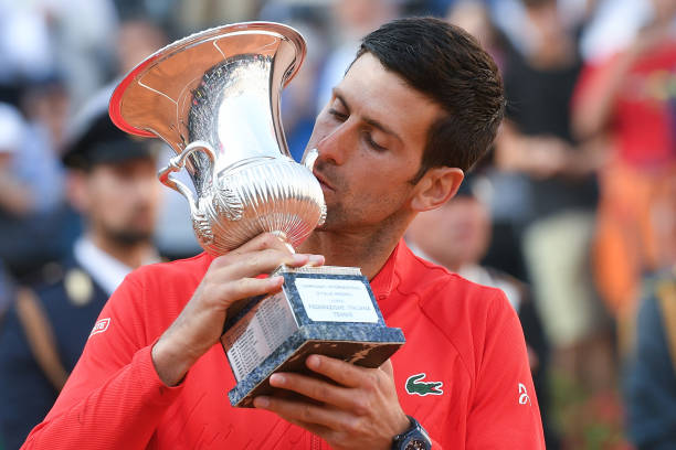 Novak Djokovic kisses the trophy during the Internazionali BNL D'Italia 2022 Final match between Novak Djokovic and Stefanos Tsitsipas on May 15,...