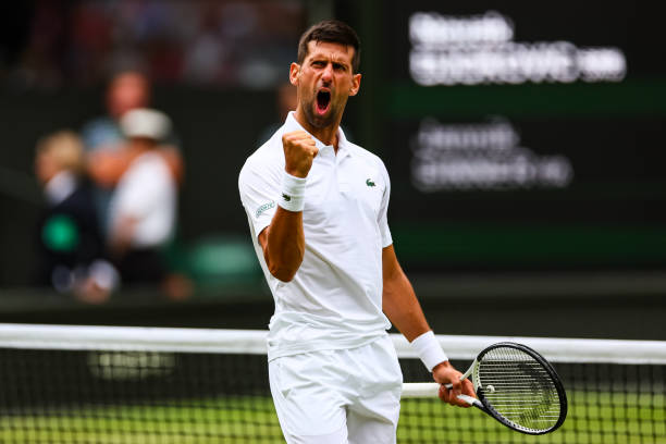 Novak Djokovic of Serbia celebrates his victory over Jannk Sinner of Italy during day nine of The Championships Wimbledon 2022 at All England Lawn...