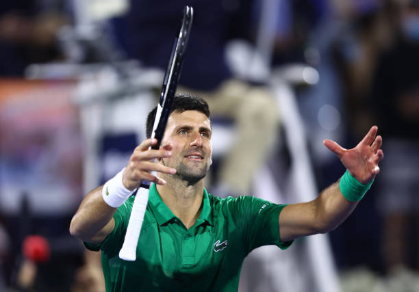 Novak Djokovic of Serbia celebrates victory against Lorenzo Musetti of Italy during day eight of the Dubai Duty Free Tennis at Dubai Duty Free Tennis...