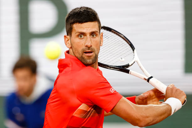 Novak Djokovic of Serbia in action against Yoshihito Nishioka Japan during the 2022 French Open at Roland Garros on May 23, 2022 in Paris, France.