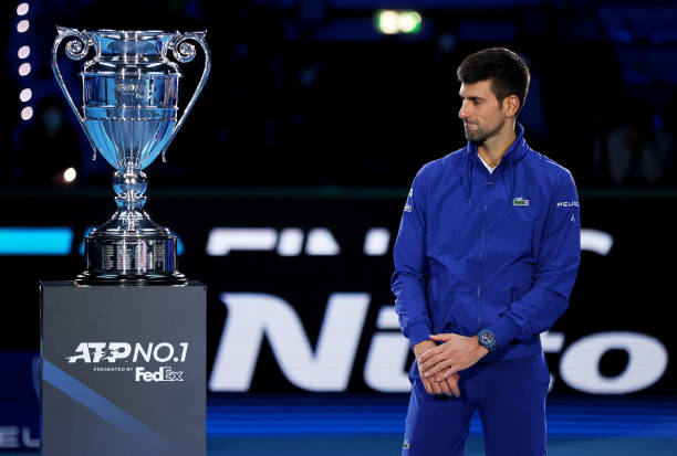 Novak Djokovic of Serbia stands next to his world number 1 trophy for his 7th consecutive year of Norway during Day Two of the Nitto ATP World Tour...