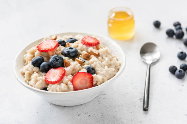 Oatmeal porridge with blueberry, strawberry and almonds
