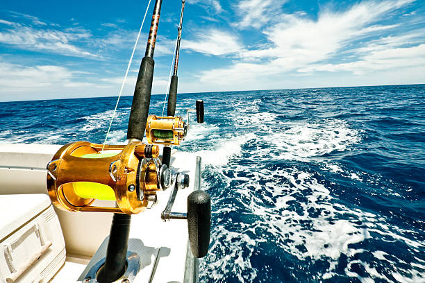 ocean fishing reels on a boat in the ocean picture