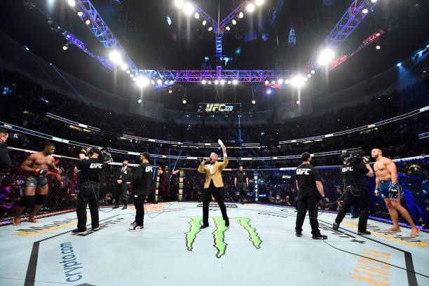 Octagon announcer Bruce Buffer introduces the main event prior to their UFC heavyweight championship fight during the UFC 270 event at Honda Center...
