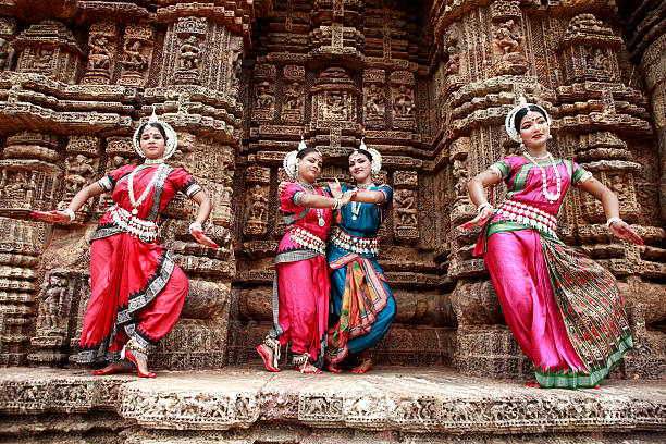 odissi dancers striking a pose - indian classical dance stock pictures, royalty-free photos & images