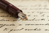 old fountain pen on manuscript