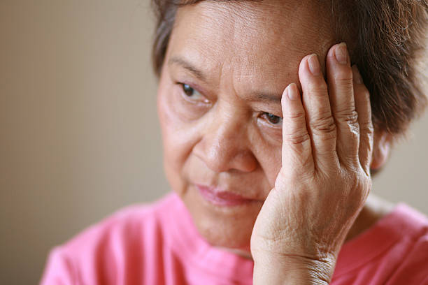 older woman worried about the future - asian old woman stock pictures, royalty-free photos & images