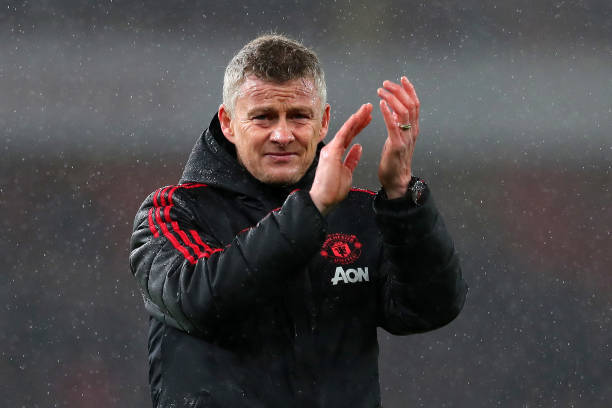 Ole Gunnar Solskjaer, Interim Manager of Manchester United acknowledges the fans following the Premier League match between Arsenal FC and Manchester...