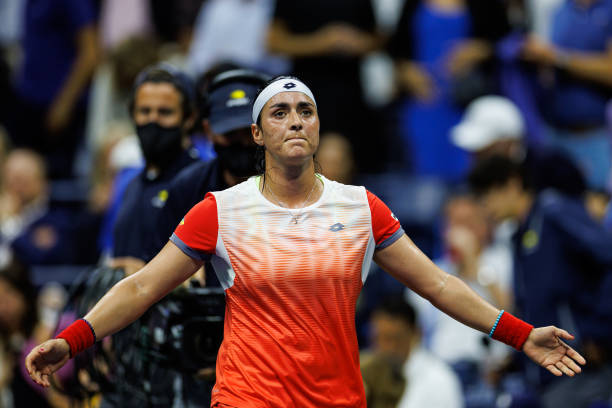Ons Jabeur of Tunisia celebrates her victory over Caroline Garcia of France in the semi-finals of the women's singles at the US Open at the USTA...