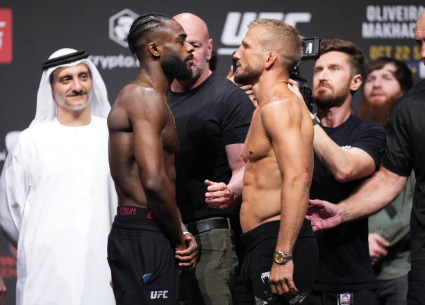 Opponents Aljamain Sterling and TJ Dillashaw face off during the UFC 280 ceremonial weigh-in at Etihad Arena on October 21, 2022 in Abu Dhabi, United...