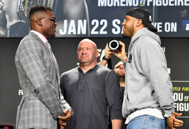 Opponents Francis Ngannou of Cameroon and Ciryl Gane of France face off during the UFC 270 press conference at the Anaheim Convention Center on...