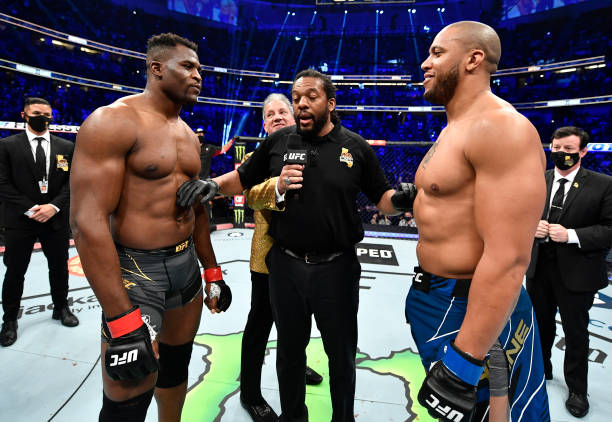 Opponents Francis Ngannou of Cameroon and Ciryl Gane of France face off prior to their UFC heavyweight championship fight during the UFC 270 event at...