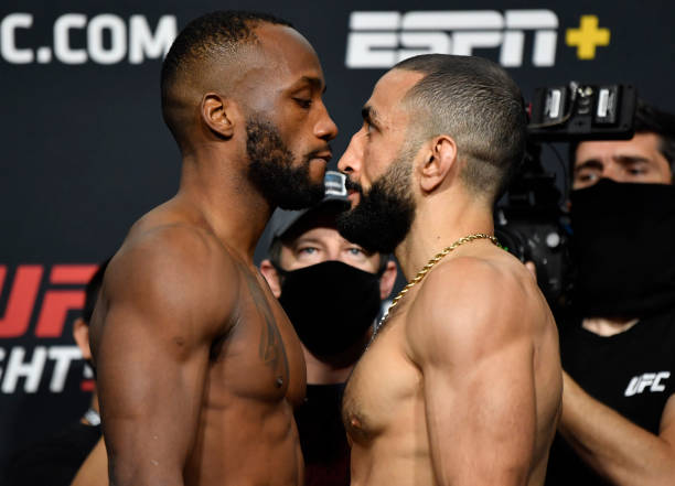 Opponents Leon Edwards of Jamaica and Bulal Muhammad face off during the UFC weigh-in at UFC APEX on March 12, 2021 in Las Vegas, Nevada.
