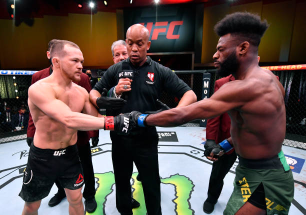 Opponents Petr Yan of Russia and Aljamain Sterling face off prior to their UFC bantamweight championship fight during the UFC 259 event at UFC APEX...