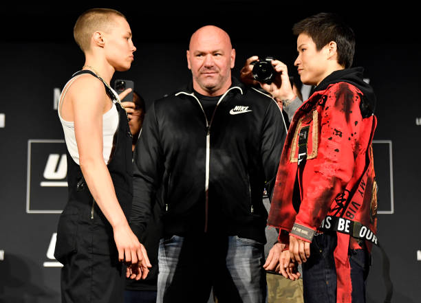 Opponents Rose Namajunas and Zhang Weili of China face off during the UFC 268 press conference at The Hulu Theater at Madison Square Garden on...