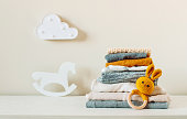 Organic cotton baby clothes on the shelf