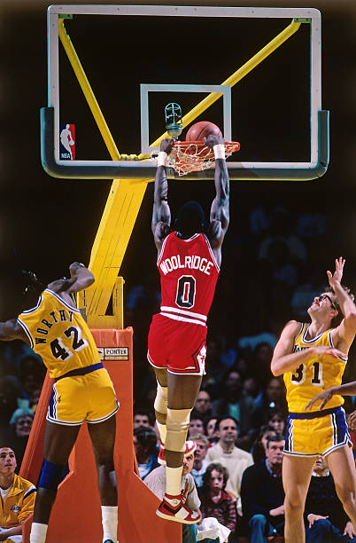 orlando-woolridge-of-the-chicago-bulls-dunks-the-ball-against-the-los-picture-id588185112