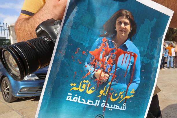 Palestinian journalist protests the death of veteran Al-Jazeera journalist Shireen Abu Akleh, who was shot dead while covering an Israeli army raid...