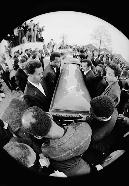 Pallbearers carry the coffin of Martin Luther King ,Jr. To its grave at the South View Cemetery.
