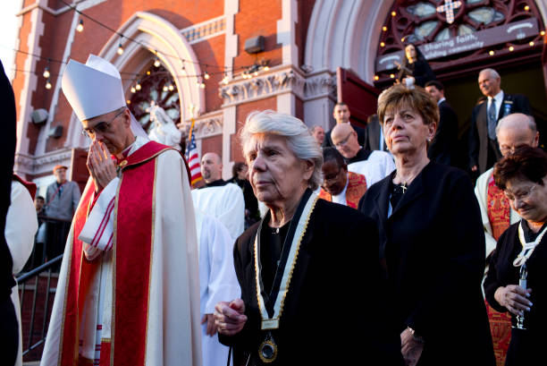 Parishioners from a church in the Italian American neighborhood of Carroll Gardens march through the streets on Good Friday, April 14, 2017 in...