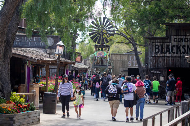 Visitors walking in Old Town in Knott's Berry Farm.