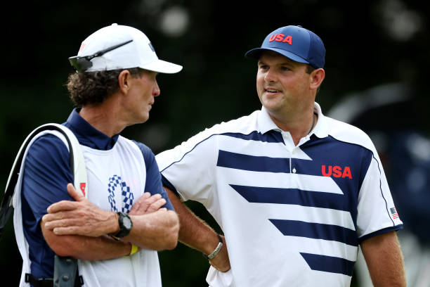 https://media.gettyimages.com/photos/patrick-reed-of-team-united-states-talks-with-his-caddie-and-swing-picture-id1331244345?k=6&m=1331244345&s=612x612&w=0&h=JAJD3x5RNgfM_R051cw-DhPi8PWQ9T7U6CldF_2HB3w=