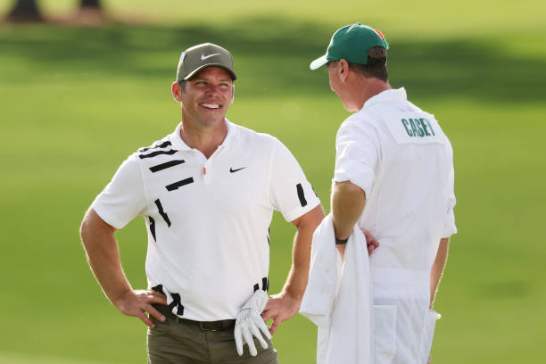 Paul Casey of England and caddie John McLaren talk during the first round of the Masters at Augusta National Golf Club on November 12 2020 in Augusta...
